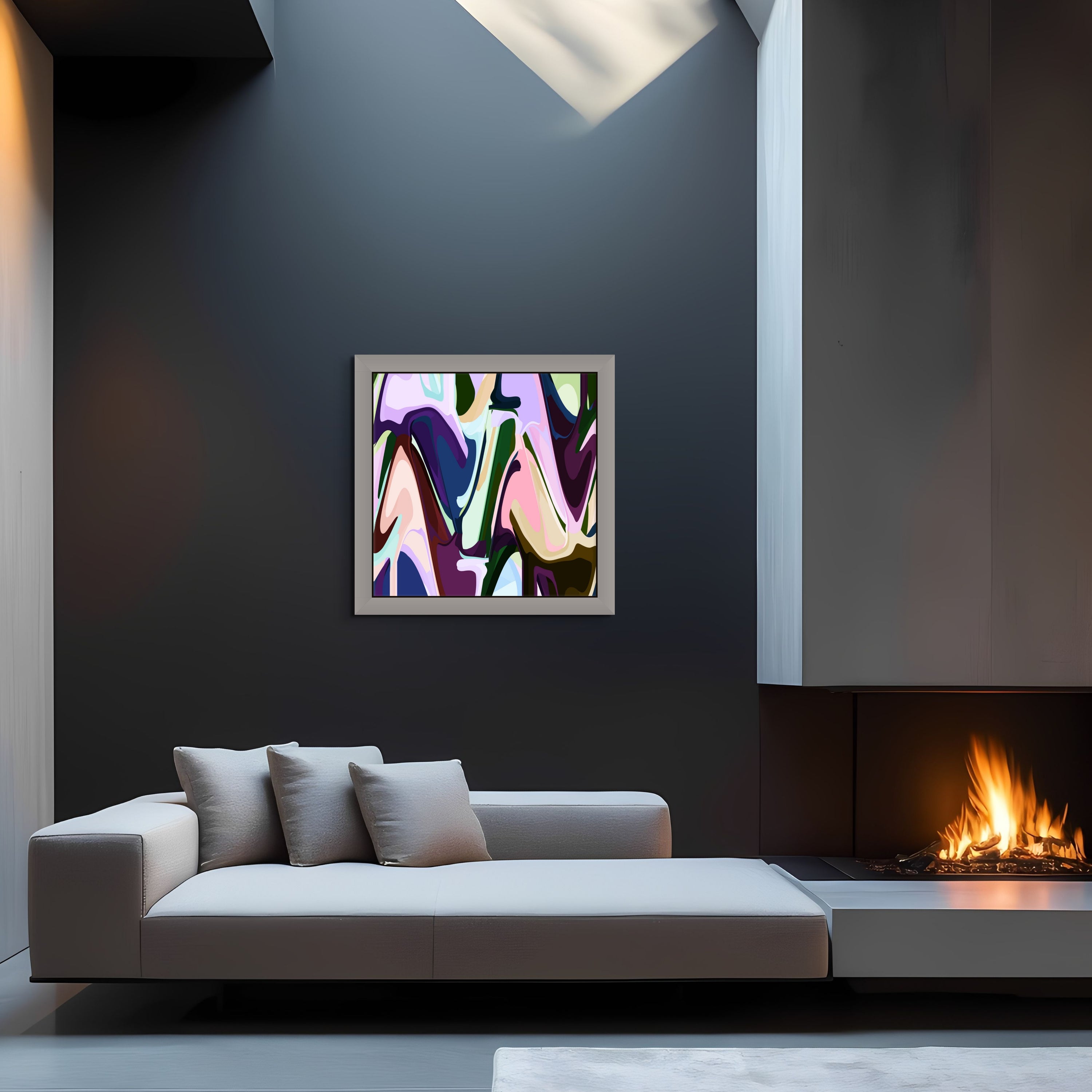 A modern living room features the Box Bet gray sofa by Beau Monet, a lit fireplace, dark walls, and vibrant abstract wall art above the couch. Natural light streams through a skylight.