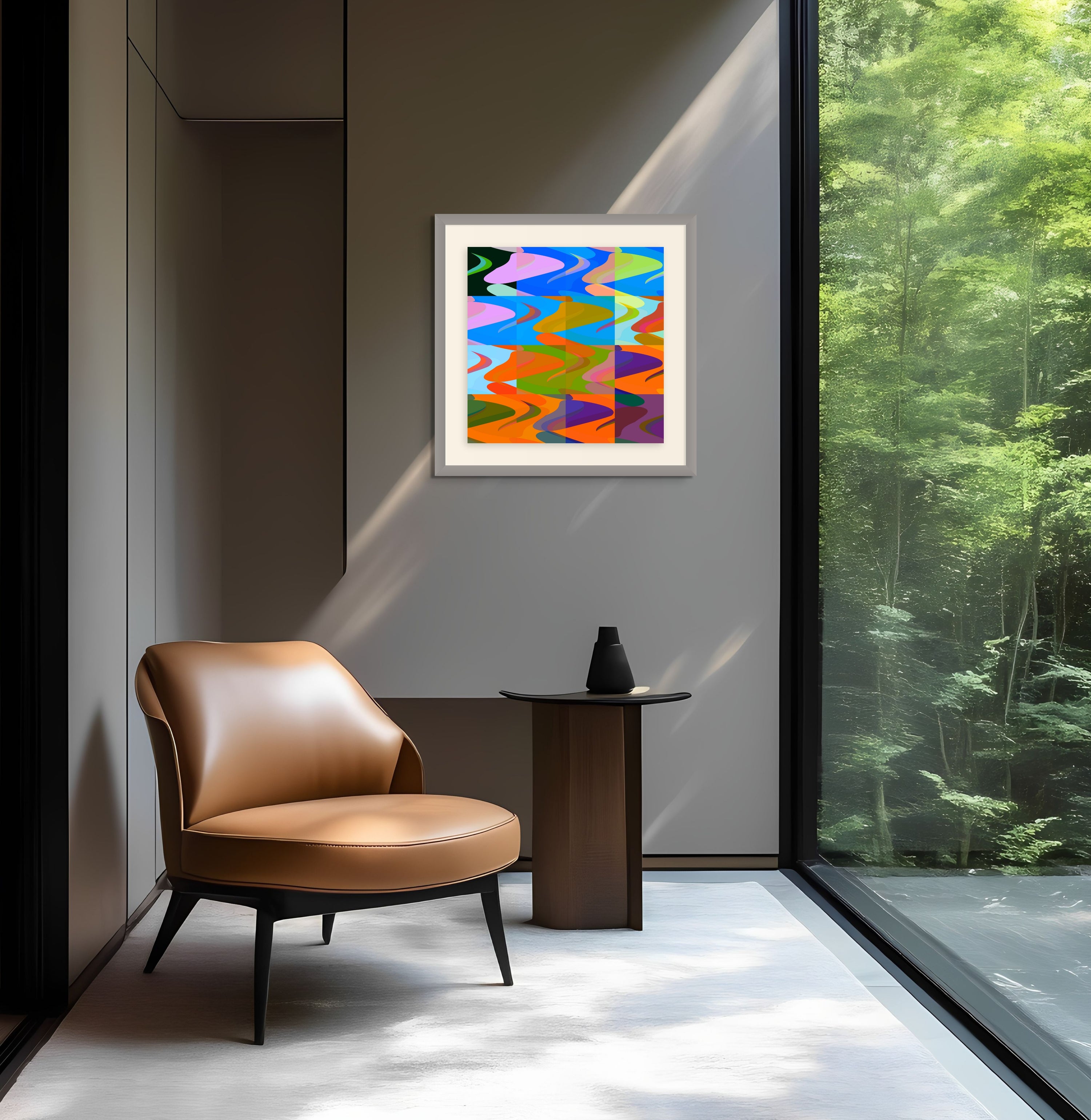 A modern room features Beau Monets Camp Fire abstract art on the wall, a tan leather chair, and small side table. Floor-to-ceiling windows frame lush green trees, bathing the space in natural light.