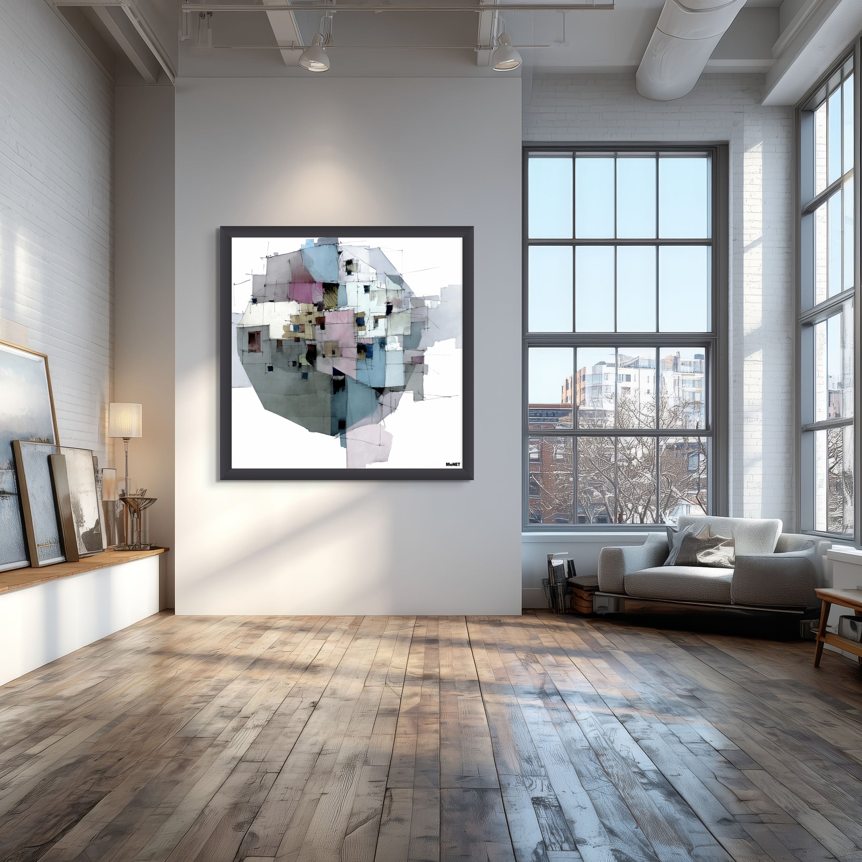 A modern loft with large windows and wooden floors showcases Beau Monets Downtown Dew wall art, adding a contemporary touch to the cozy seating area as sunlight streams in.